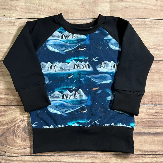 Penguin Whale Island Black Grow with Me Sweater